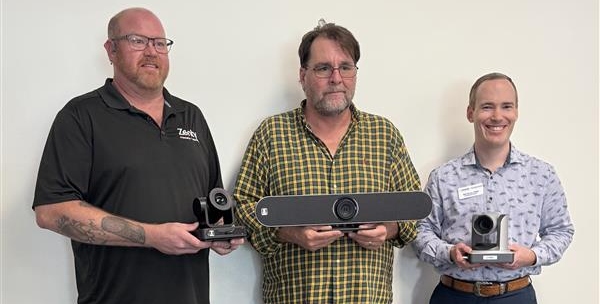 From left to right, Adrian Wagner, director of Sales & Support, J-Tech Digital; Matt Adams, program coordinator, Smart Building Technology program and Will Horton, HCC Foundation development director pose with PTZ cameras donated to the college in support of the Smart Building Technology program.